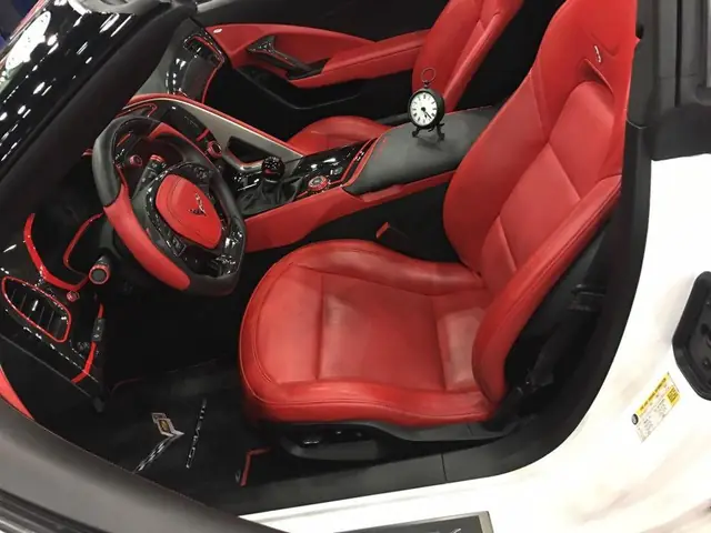 Red leather Corvette interior after a full interior detail, seats and console cleaned and conditioned
